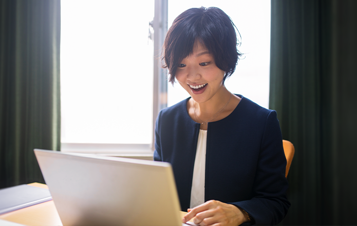 Woman looking at her laptop