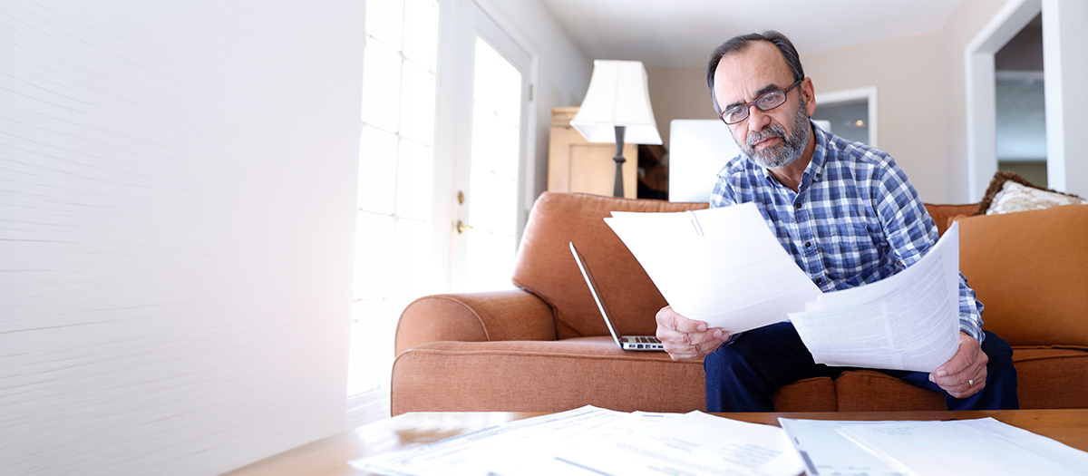 Man looking at documents